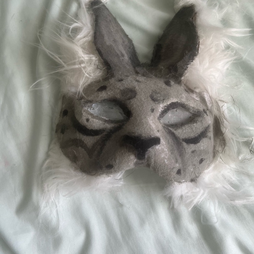 Gray and black therian mask